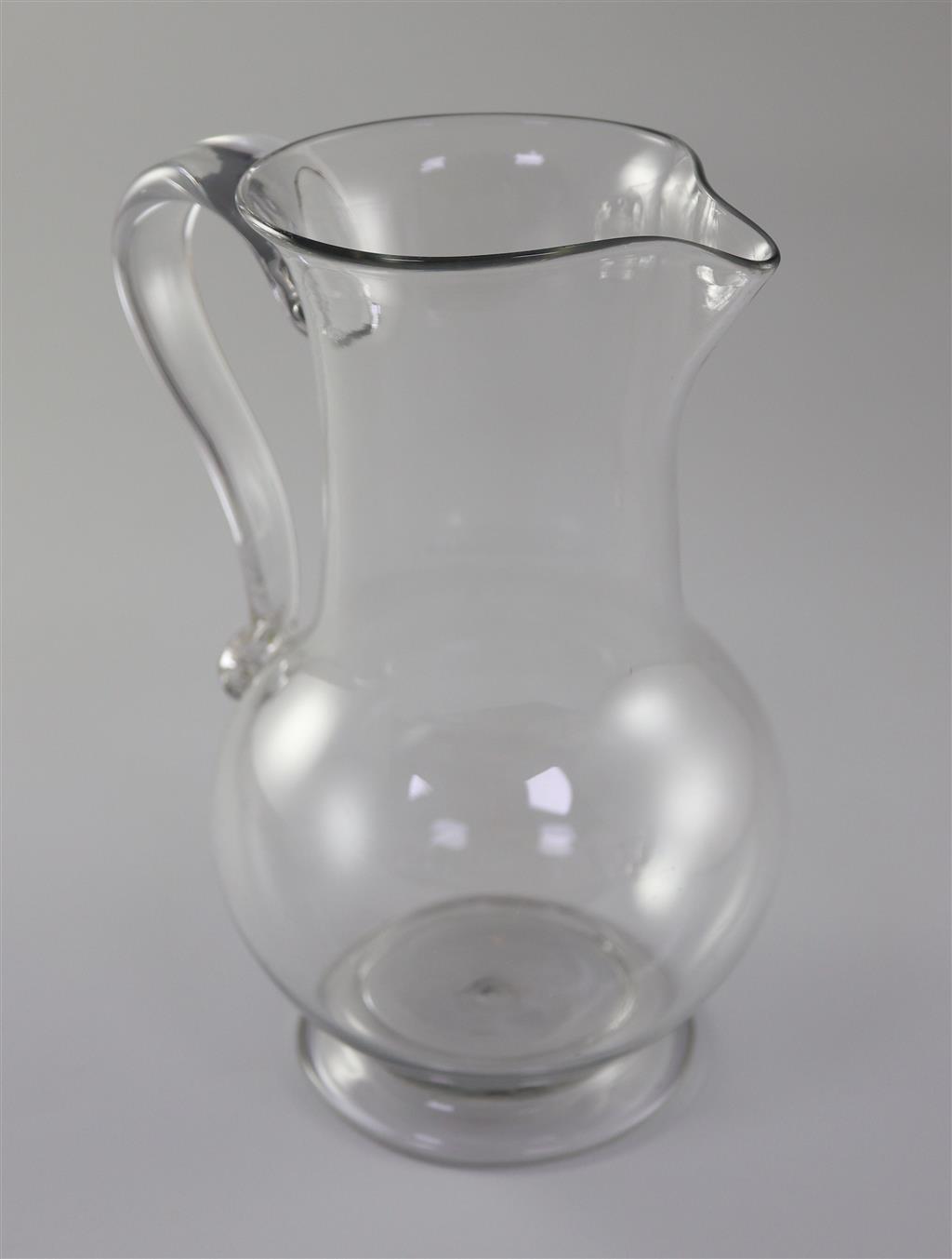 A Georgian plain baluster glass jug, 18th century, 21cm high